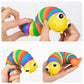 Rainbow slug fidget toy in dynamic motion, showcasing its extreme flexibility and movement.