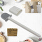 Portable silicone toilet brush and holder set on a plain white background.