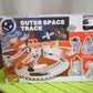 Packaging of the Space Race Track Set showcasing its key features.