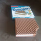 Overhead shot of the Chocolate Diary Notebook, emphasizing its compact size and design.
