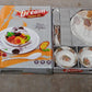 The 18-piece plastic dinner set packaged in a colorful box, ideal for gifting.