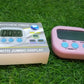 Digital kitchen timer with a retractable stand for versatile placement.