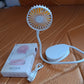 Mini USB Fan held in hand showcasing compactness