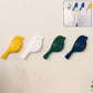 A set of four elegant self-adhesive bird hooks displayed against a clean wall.