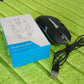 The Compshop wired optical mouse positioned on a desk next to a keyboard, ready for use.