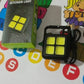 The compact 4 LED mini keychain light attached to a set of keys.