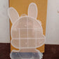 Top-down view of the transparent bear jewelry box, ready for daily use.