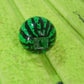 Watermelon pencil sharpener shown from side angle, highlighting smooth surface