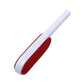 Multi-purpose pet fur remover brush effectively cleaning a pet bed.