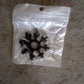 The unique snowflake shape of the versatile 18-in-1 pocket multi-tool on display.