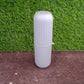 Textured capsule-shaped travel storage bottle from Organivo for secure grip.