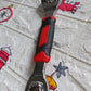 Full view of the multi-function tool, emphasizing its swivel head and multiple sockets.