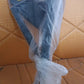 The compact Triangle Cleaning Mop showing its push-pull wringing mechanism.
