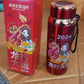 Vacuum insulated bottle with lid showing water temperature display for convenience