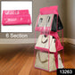 Side view of the hanging purse organizer with handbags, ideal for wardrobe storage.