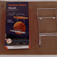 Stainless steel kitchen organizer holding various Indian kitchen utensils, including a rolling pin.