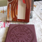 Packaging of the chocolate scented notebook, ideal for gifting.