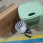 Lifestyle shot featuring the mini portable washer used in a modern apartment setting.