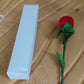 Artificial rose jewelry box with realistic stem and velvet finish