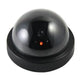 Realistic wireless dummy security camera with a visible lens for effective deterrence.