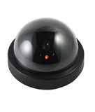 Realistic wireless dummy security camera with a visible lens for effective deterrence.