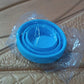 Collapsible foldable silicone drinking mug with its lid, ready for a hot or cold beverage.