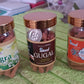 Assortment of Indo Glow mix flavour dhoop cones in a clear container.