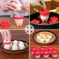 An attractive display of the Nonstick Egg Boiler cups alongside cooked shell-free eggs.