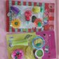 The set of fancy erasers presented in their appealing packaging, ideal for gifting or retail display.