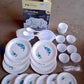 Stacked plastic dinner plates adorned with blue floral decoration