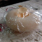 VelvaBloom flower bath sponge in its elegant packaging, ready for delivery.