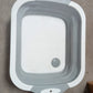 Dimensions of the foldable chopping board, illustrating its compact design.