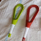 Close-up view of the durable plastic balloon whisk from Quickslice.