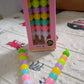 Cute pearl gel pens set with a playful arrangement, designed to inspire young artists and writers.