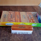 6 piece cleaning brush set with assorted printed tops and nylon bristles