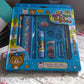Compact stationery kit with safety scissors and a functional pencil sharpener.