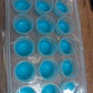 Smart push out round silicone mold for creating ice cubes or mini chocolates.