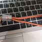 Lifestyle image of a user enjoying hands-free convenience with the secure phone wrist strap.