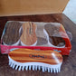 Close-up of durable plastic laundry brush with medium-hard nylon bristles