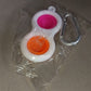 Pop It style fidget toy keychain, a fun sensory item.