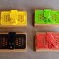 Packaging of the PHOBIA Mobile Charging Holder, emphasizing its easy installation.