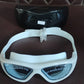 Wide vision swimming goggles displayed on white background with packaging