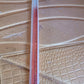 Close-up of transparent acrylic ruler with measurement scale