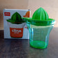 Hand holding Apex Manual Citrus Juicer for effortless fresh juice extraction