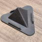 Brown Pyramid Mobile Stand on table with smartphone in place