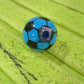 Ergonomic handheld round design pencil sharpener, comfortable for kids to use.