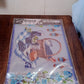 The complete set of 6 multicolor PVC dining table placemats, neatly packaged.