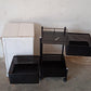 Fully assembled 3-layer metal kitchen trolley with wheels in a modern kitchen setting.