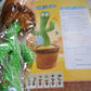 USB charging port visible on the base of the interactive dancing cactus toy.