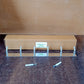 Compact stainless steel 6-hook coat rack hung with towels and coats in home